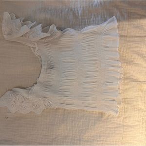 aqua ruffled white tank with detailed sleeves, worn once in good condition